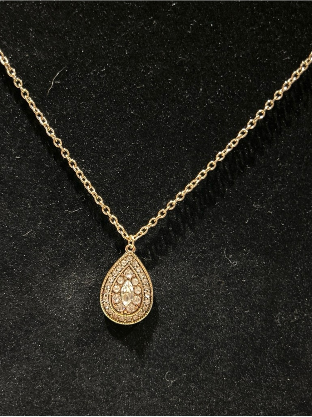 Gold color Teardrop Pendant Necklace with white stone Accents